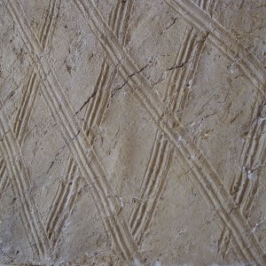 Historisches Detail auf einer Lehmwand