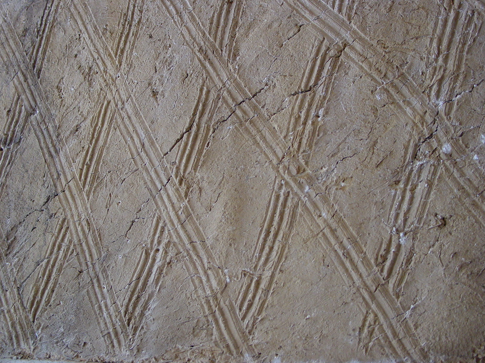 Historisches Detail auf einer Lehmwand